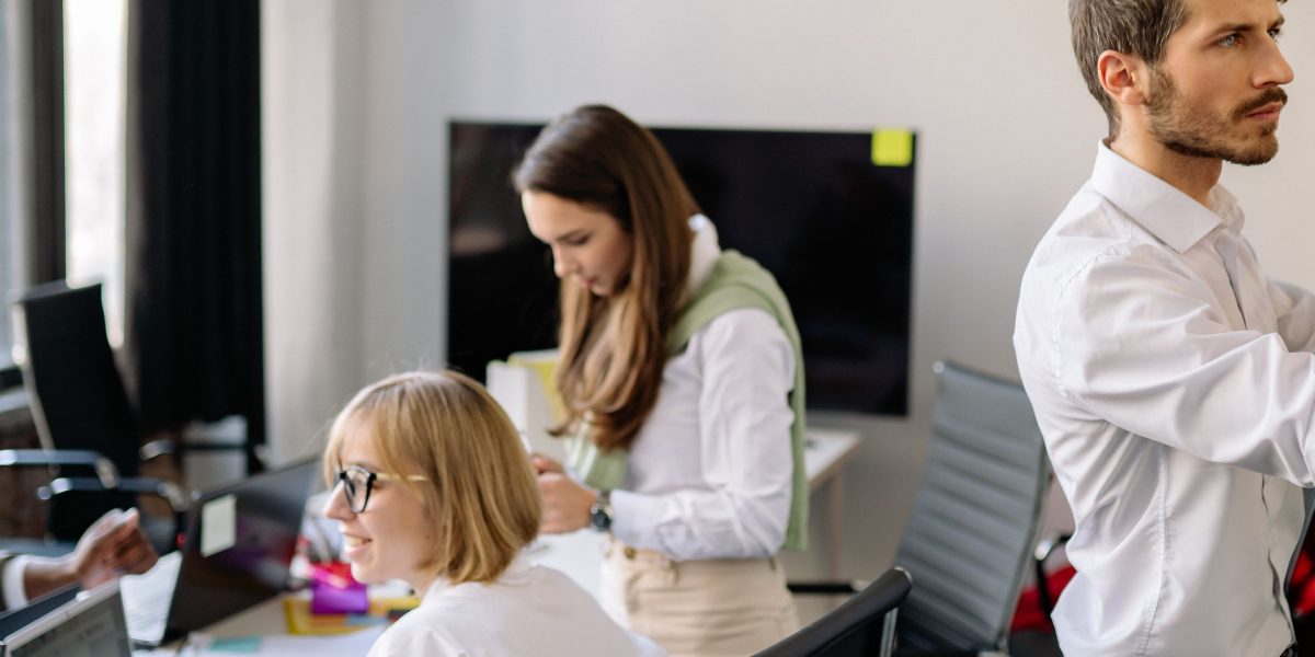 A diverse team working together to plan and execute the deployment of a new system or model.