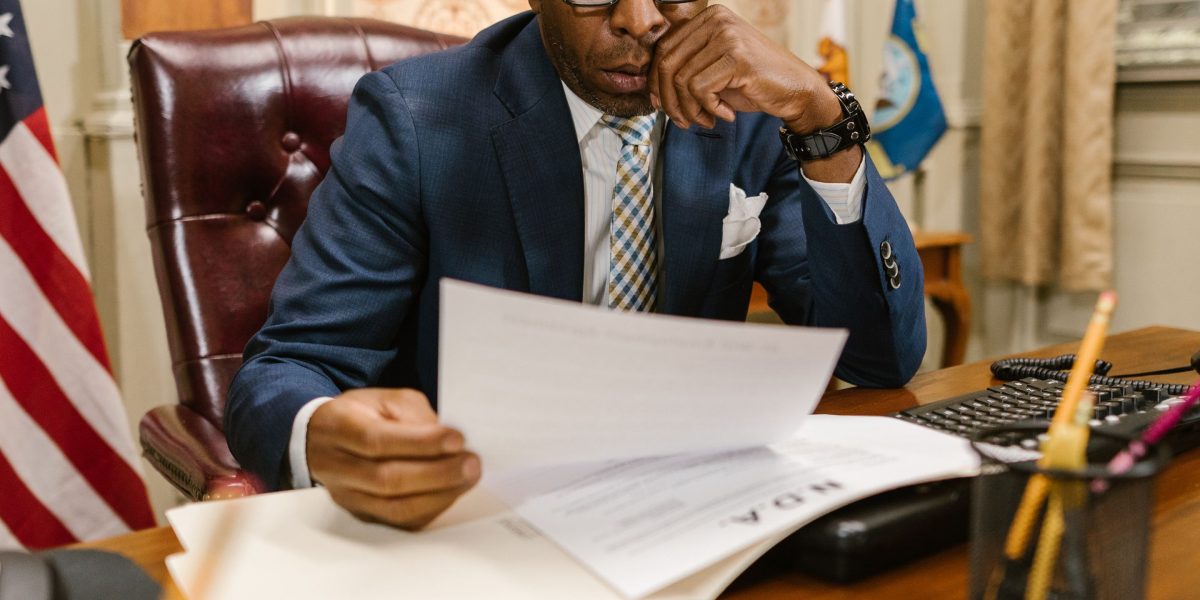 A lawyer meticulously reviewing documents, emphasizing the importance of human oversight and critical evaluation of AI-generated content.