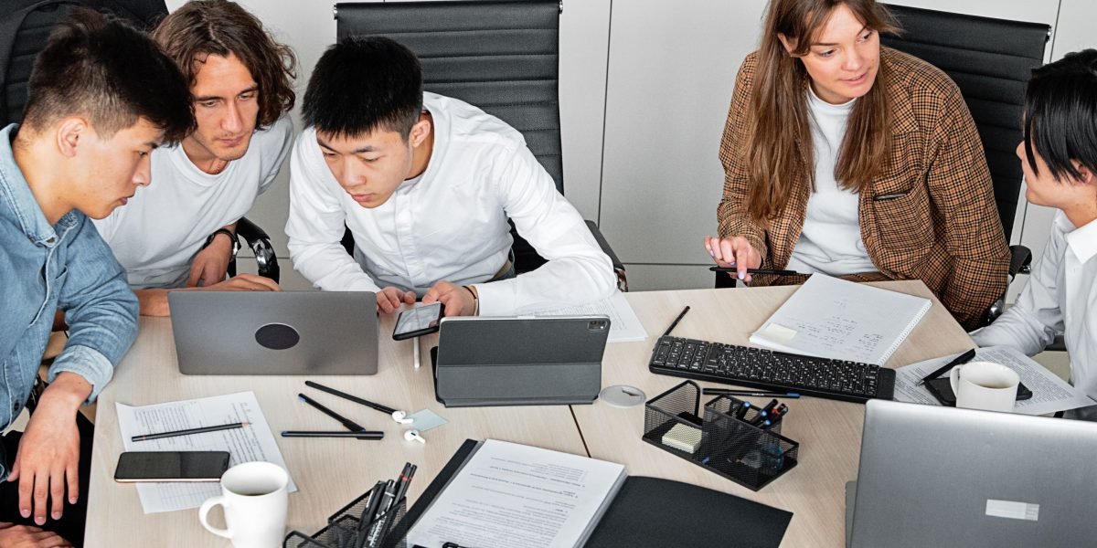 A team collaborating on data strategy, highlighting the organized nature of data science.