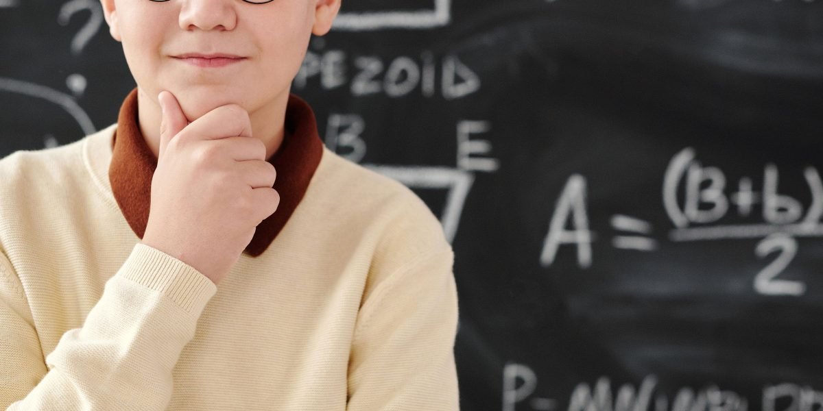 An individual engaged in deep thought, symbolizing the use of general-purpose LLMs for problem-solving and debugging.