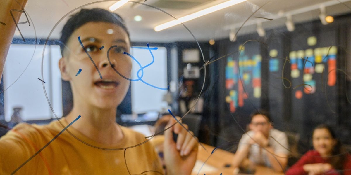 People working together to overcome challenges in complex ML pipeline solutions.