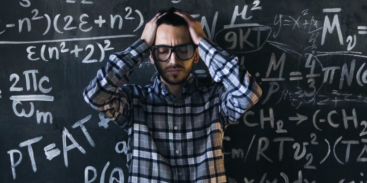 A data professional deeply focused, analyzing complex data to find optimal solutions.