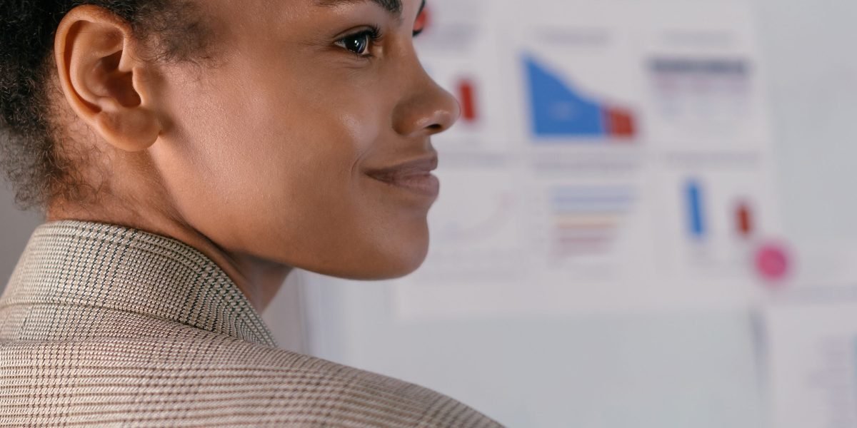 A confident data scientist presenting successful project outcomes, reflecting robust and efficient machine learning pipelines.