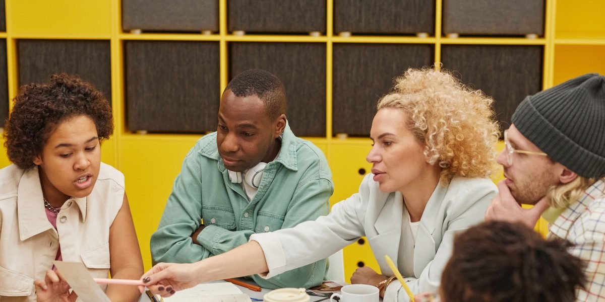 A team collaborating and strategizing, using insights to plan future business moves.