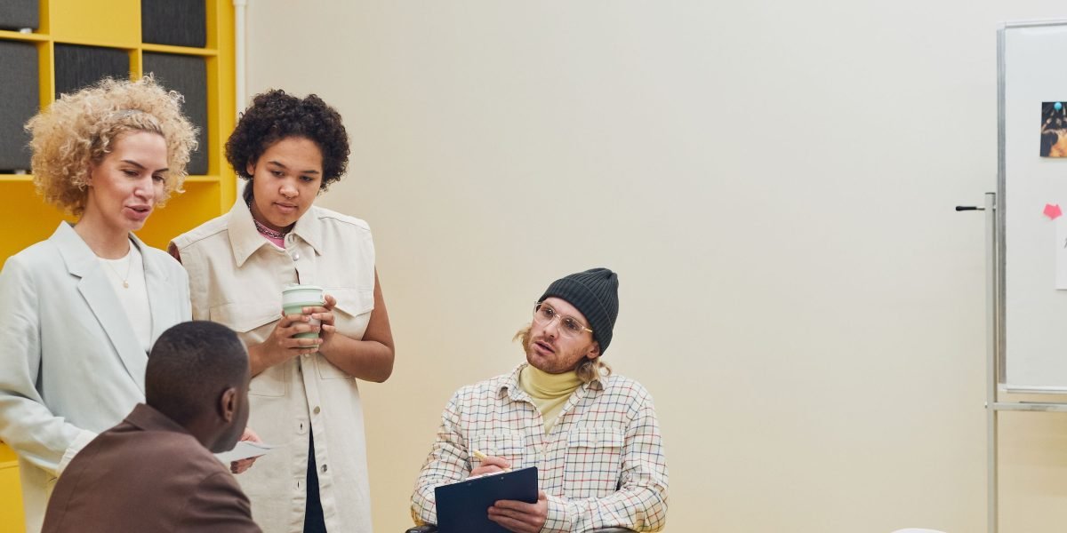 A team engaged in collaborative discussion, symbolizing the integration of advanced techniques.