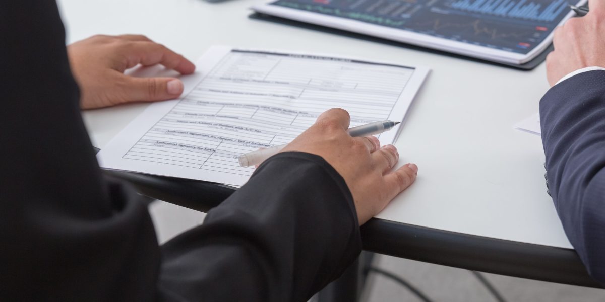 A professional team intently analyzes data and performance indicators to evaluate the success of a project.