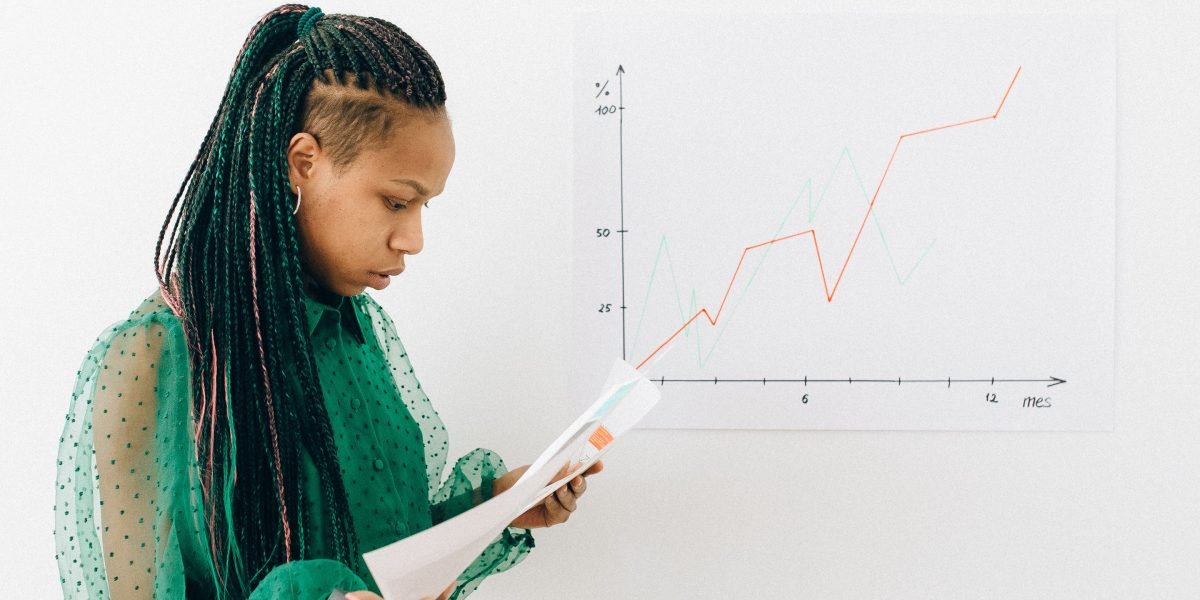 A professional evaluating data to understand performance improvements and bottlenecks.