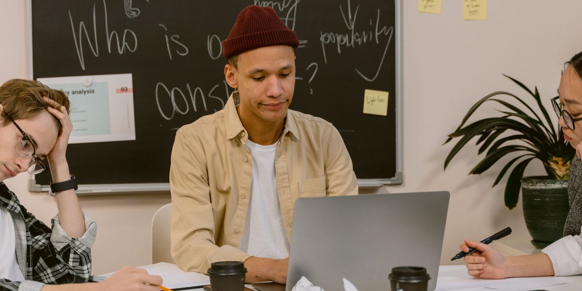 A group of educators thoughtfully discusses best practices and ethical considerations for integrating AI into learning environments.