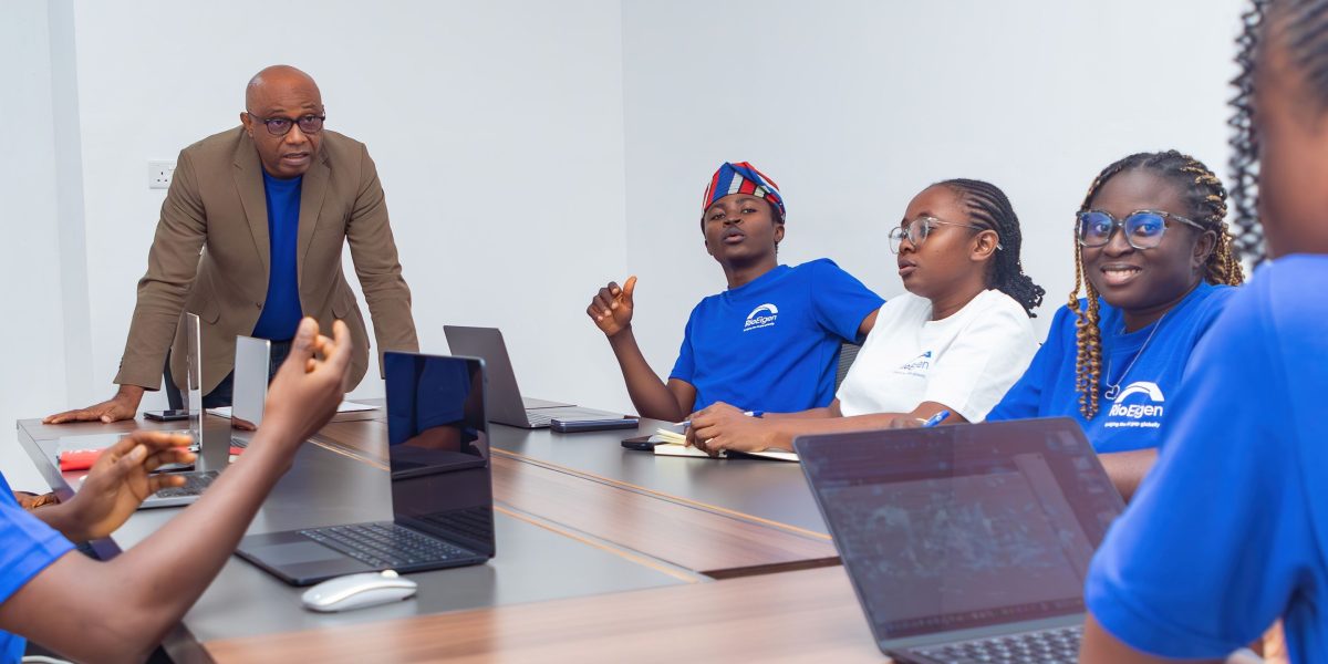 A team of professionals collaborating effectively on a project in a modern office setting.
