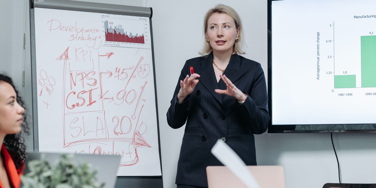 A confident business leader presenting positive results, symbolizing the measurable impact and ROI of secondary data projects.