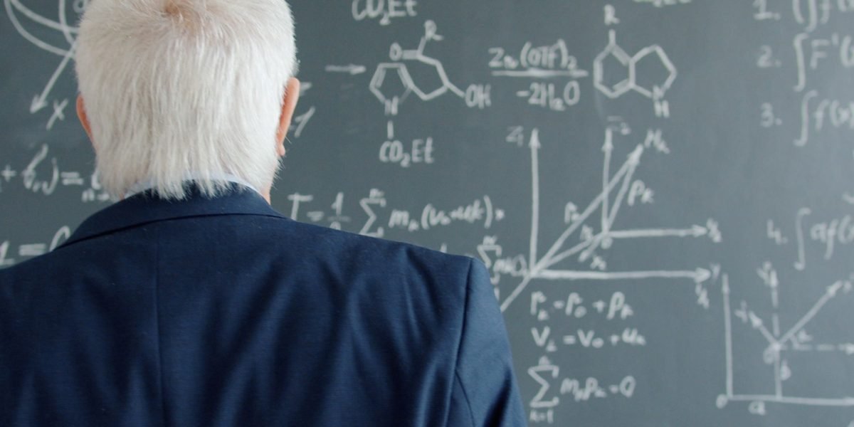 A person looking at a diagram or notes with a thoughtful yet confident expression, signifying easy comprehension.